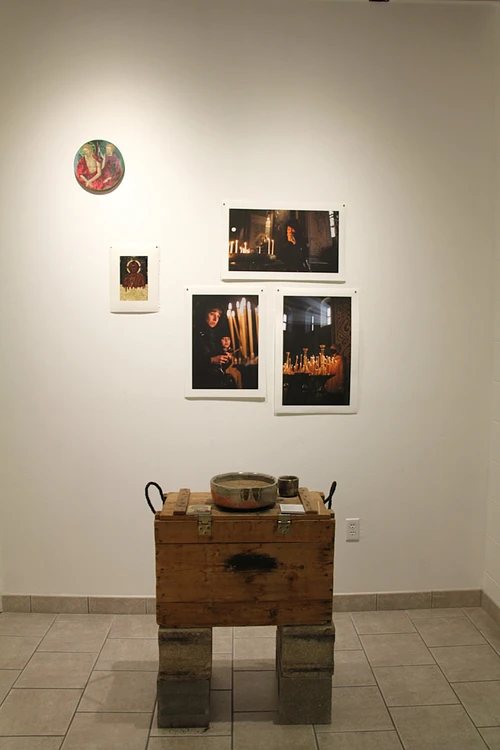 A display featuring pieces such as “Earnest Prayer of a Woman in Lviv During Russian Invasion of Ukraine” and “Lighting Candles on Christmas Day in Kyiv” is currently featured at College of the Ozarks.