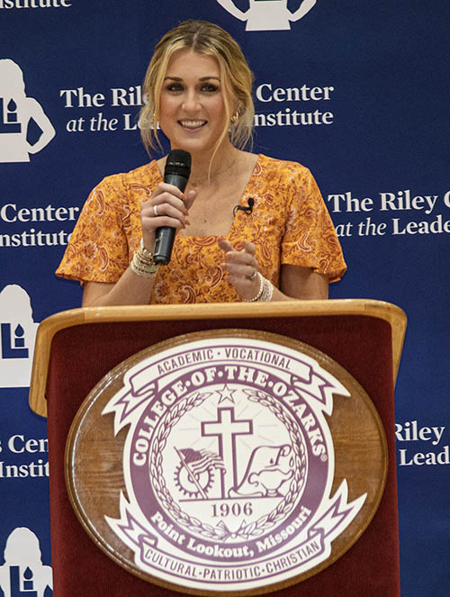Riley Gaines speaks at podium