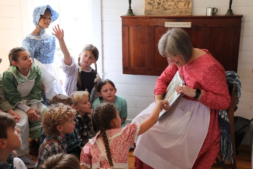 Chrissy Martin reads to students. 