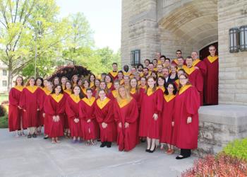 Chapel Choir standing in front of the chapel
