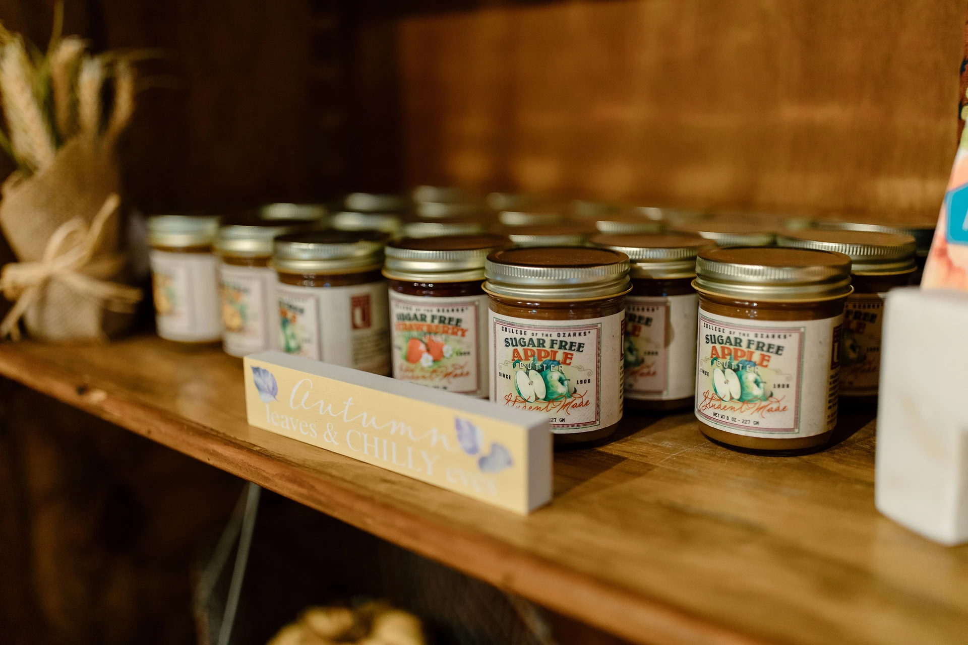 C of O Student handcrafted gifts and baked goods, including fruitcakes, fruit spreads, and student-milled products.