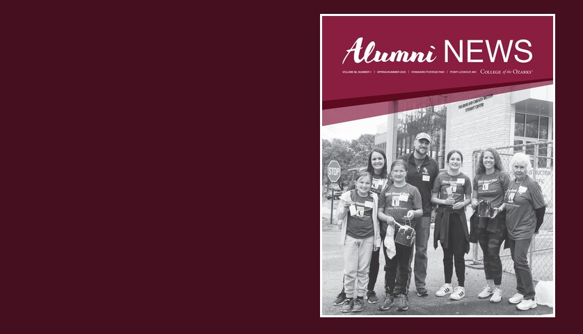 Spring/Summer 2023 Alumni News cover: alumni with awards at an outdoor event