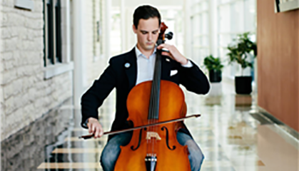 Student playing a cello.