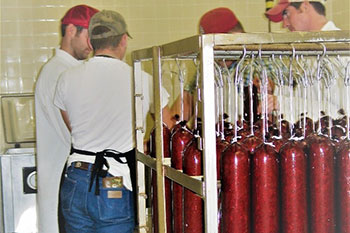 Students Processing meat in the meat processing plant