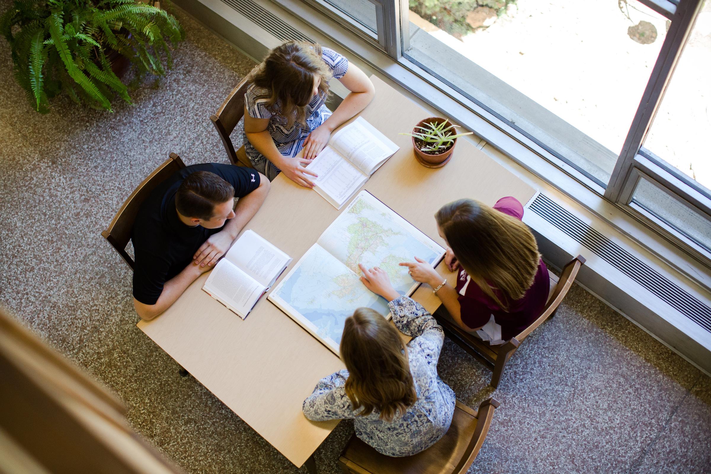 Students working on a project together