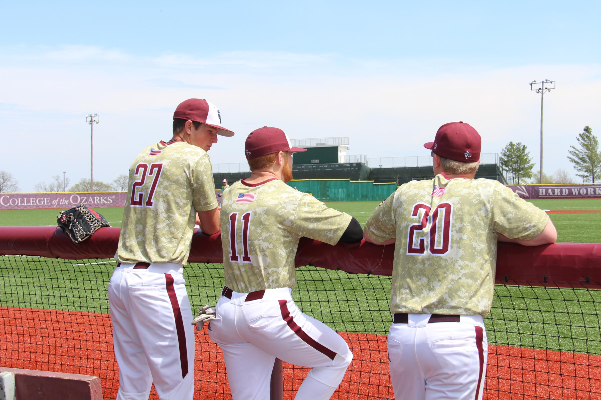 3 Baseball Students discussing the game