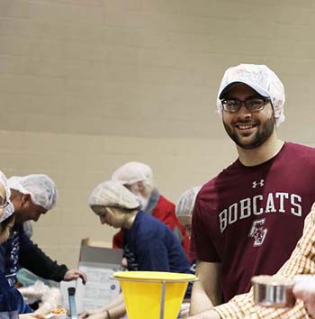 Student, Ben Lunsford, packing meals