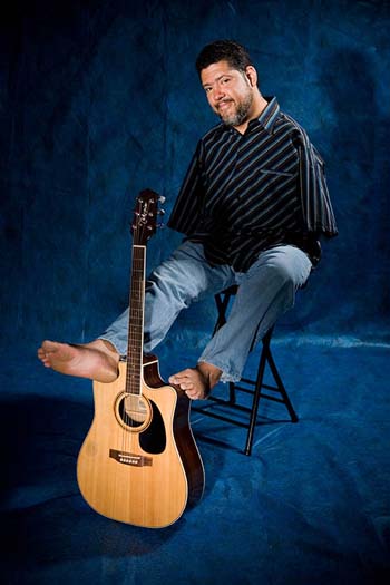 Tony Melendex with guitar