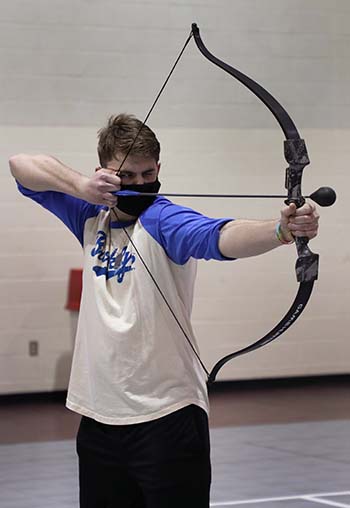 Tyler Groves, freshman elementary education major, represents his family in the Bobcat Olympics. Incoming students participate in various activities on campus during the week-long orientation program, Character Camp. 