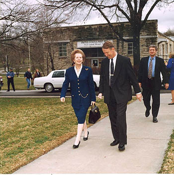Davis welcomes the late British Prime Minister Margaret Thatcher to campus. During her 1997 visit, they toured the student industries, including the Print Shop and the Fruitcake and Jelly Kitchen.