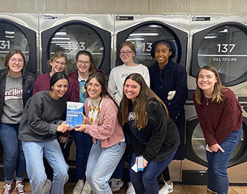 Students from the Education Department participate in Laundry Love. 