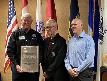 Tom Krahenbuhl, State ESGR Chair, Dr. Davis, Chancellor, CofO accepting the award. CPT Jamin Pyatt, Professor Military Science, at CofO