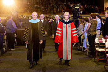 President Brad Johnson and Chancellor Jerry C. Davis walk side-by-side during the inaugural procession. 