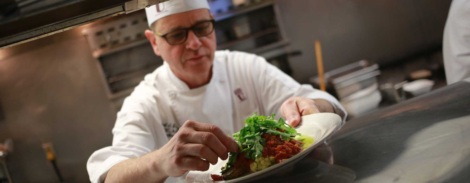 A chef preparing a dish